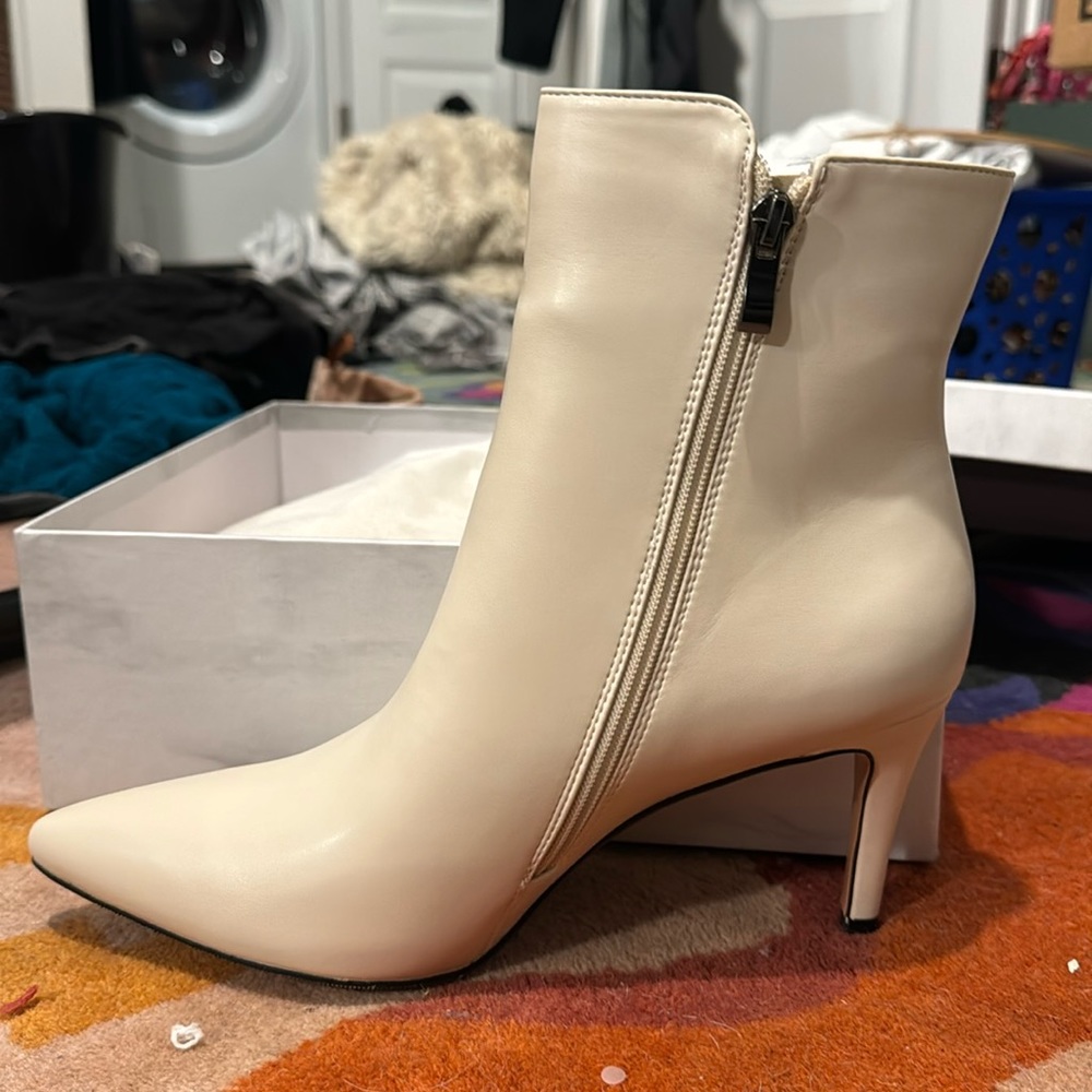 Vegan leather cream booties.